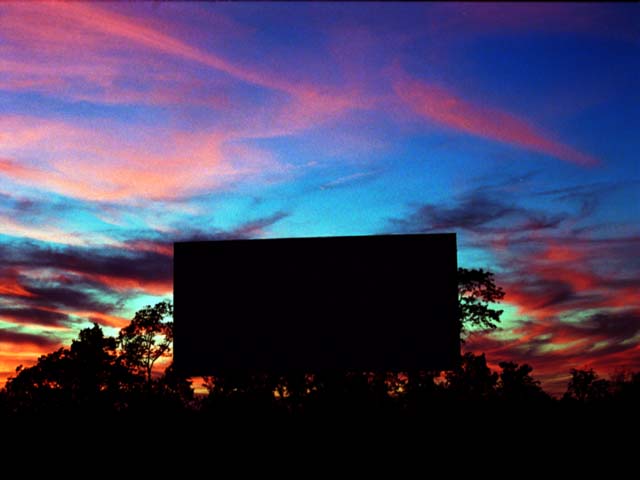 Drive In after Dark - <a href="https://www.holidayautotheatre.com/">Photo Source</a>